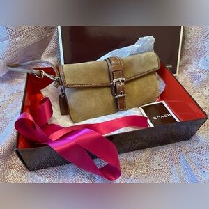 Brown coach wristlet